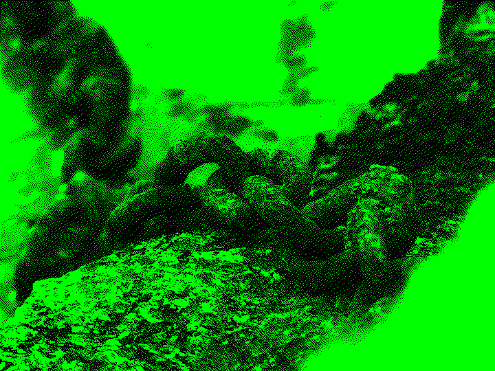 Rusty chain links on a weathered stone surface.
