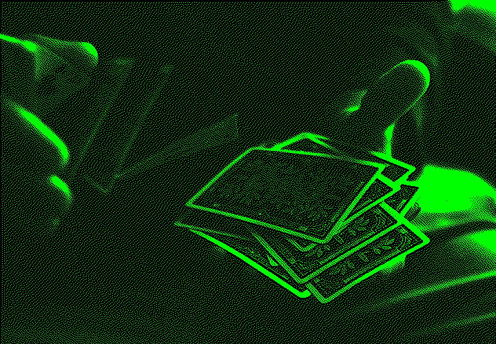 A person skilfully shuffling cards in a dimly lit setting, evoking a sense of mystery and the art of card tricks.